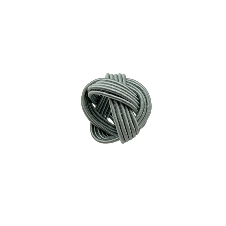 The silk napkin ring.